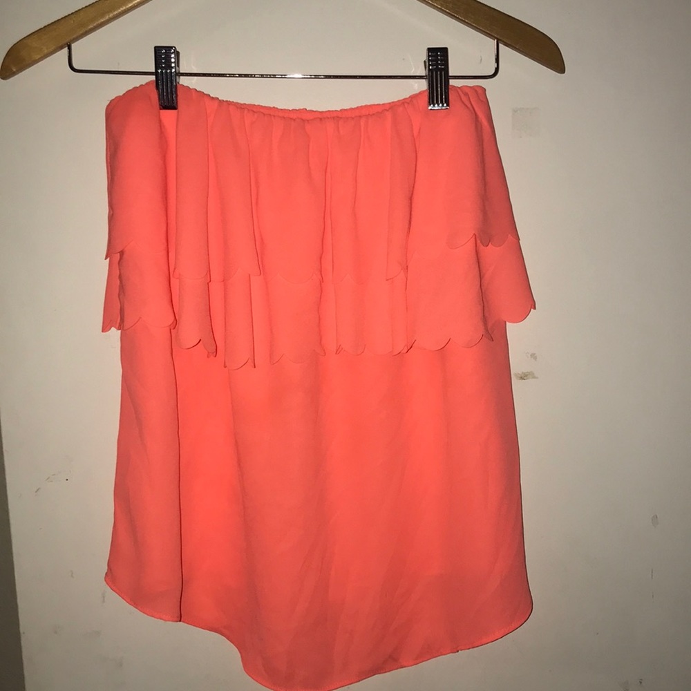 Bright orange strapless shirt